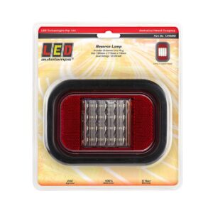Reverse reflector LED lamp with clear recessed lens and red reflector